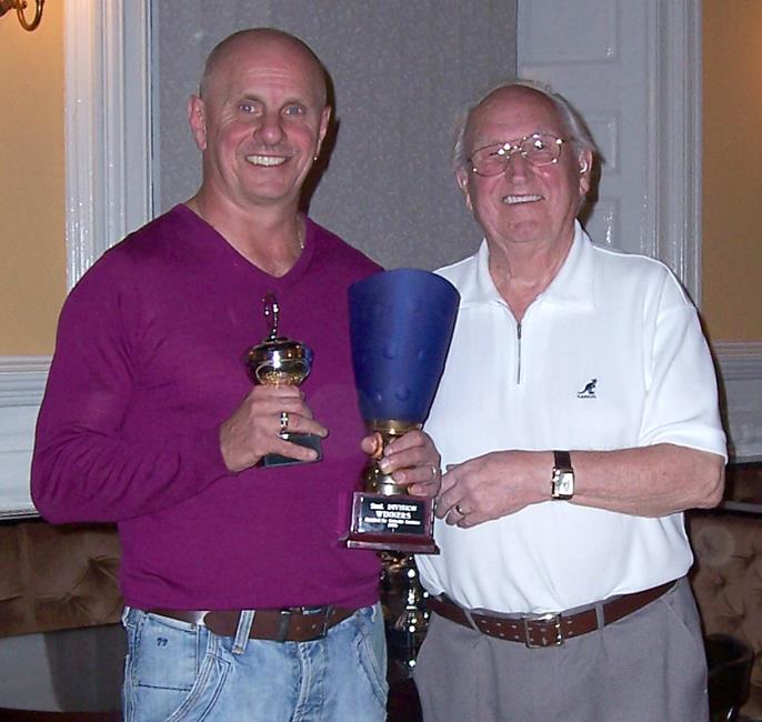 Lee Goldsmith receives the second division trophy from Al Gordon